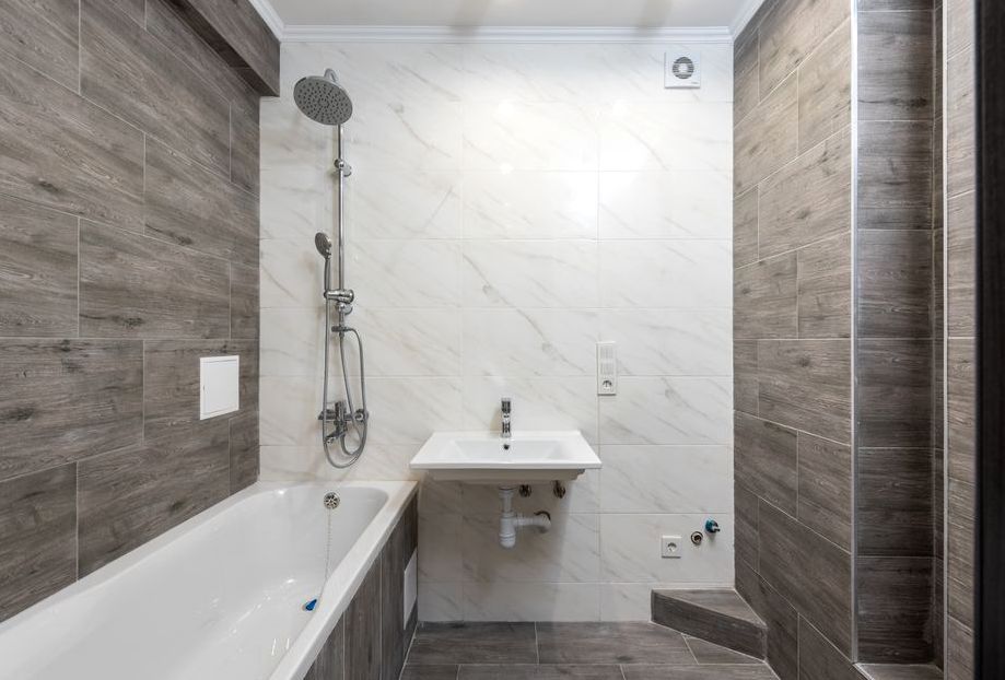 Elegant modern bathroom interior with wooden details and sleek design